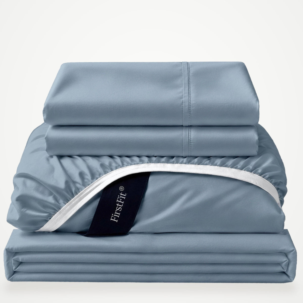 Luxe Bamboo sheet set in Dusty Blue, folded stack with fitted sheet